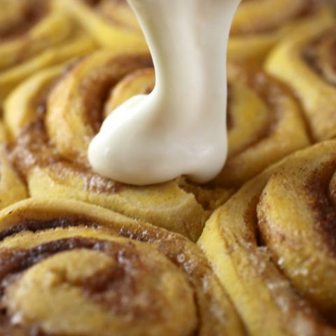 Pumpkin Pecan Cinnamon Rolls with Brown Butter Maple Icing